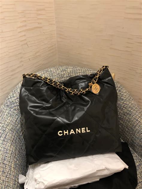 chanel 垃圾袋|Chanel handbag white.